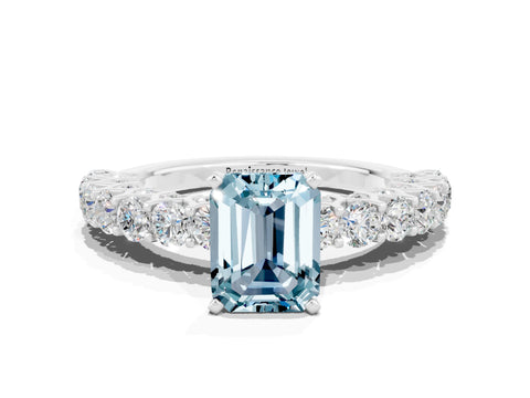 White gold Emerald Cut Aquamarine Solitaire Ring with Shared Prong Pavé Band and Four-Prong Setting