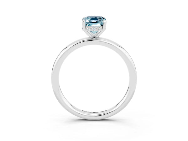 Platinum Emerald Cut Aquamarine Solitaire Ring with Thin Band and Four-Prong Setting