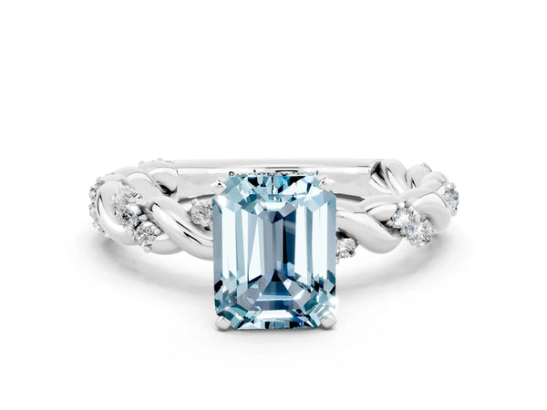 White gold Emerald Cut Aquamarine Solitaire Ring with Twisted Band and Pavé Accents