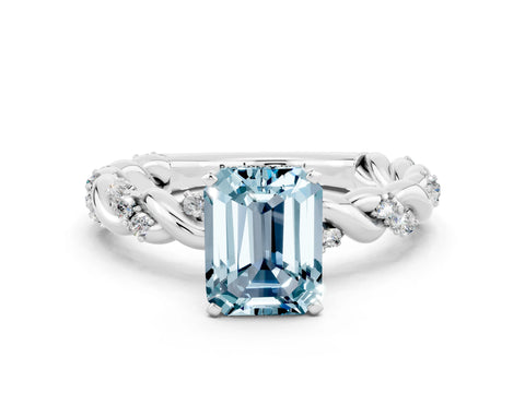 White gold Emerald Cut Aquamarine Solitaire Ring with Twisted Band and Pavé Accents