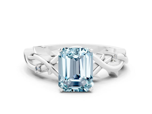 White gold Emerald Cut Aquamarine Solitaire Ring with Twisted Band and Prong Setting