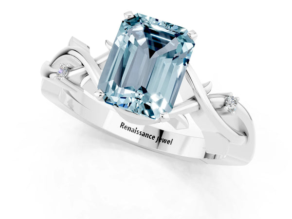 White gold Emerald Cut Aquamarine Solitaire Ring with Twisted Band and Prong Setting