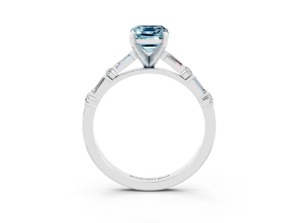 Silver Emerald Cut Aquamarine Solitaire with Side Baguettes and Channel Set Band