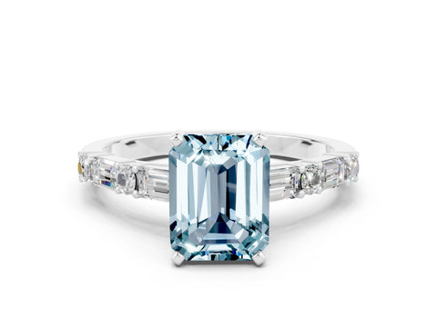 White gold Emerald Cut Aquamarine Solitaire with Side Baguettes and Channel Set Band