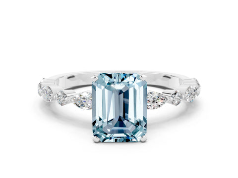 White gold Emerald Cut Aquamarine Solitaire with Side Stones on a Pavé Band and Four-Prong Setting