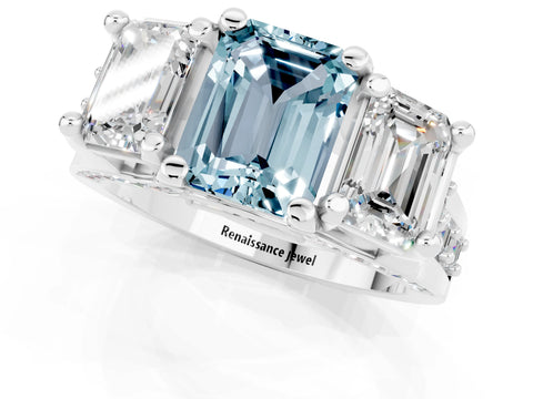 White gold Emerald Cut Aquamarine Three-Stone Ring with Channel Set Band and Four-Prong Setting_1