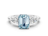 Platinum Aquamarine Three-Stone Ring with Pear Side Stones and Prong Setting