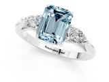 Platinum Aquamarine Three-Stone Ring with Pear Side Stones and Prong Setting