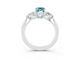 Platinum Aquamarine Three-Stone Ring with Pear Side Stones and Prong Setting