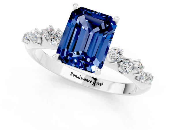 White gold Emerald Cut Blue Sapphire Cluster Side Stone Solitaire Ring with Prong Setting