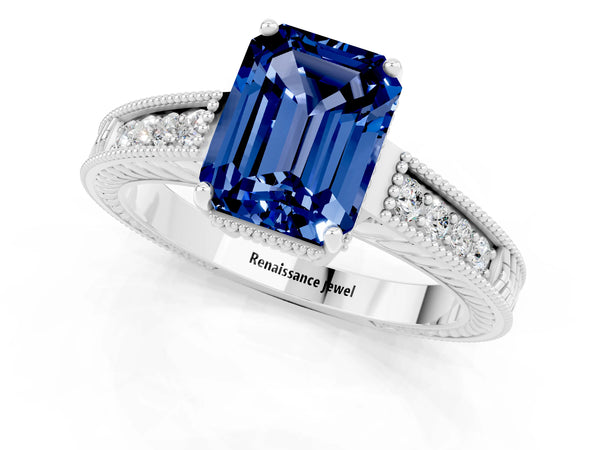 Platinum Emerald Cut Blue Sapphire Engagement Ring with Milgrain Channel Set Band and Prong Setting