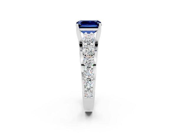 Silver Emerald Cut Blue Sapphire Engagement Ring with Pavé Band and Four-Prong Setting