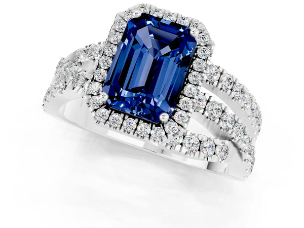 White gold Emerald Cut Blue Sapphire Halo Ring with Round Split Shank and Prong Setting