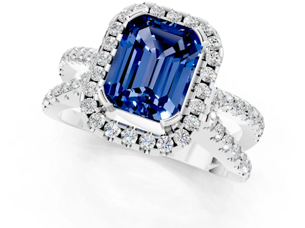 Platinum Emerald Cut Blue Sapphire Halo Ring with Split Shank Pavé Band and Prong Setting