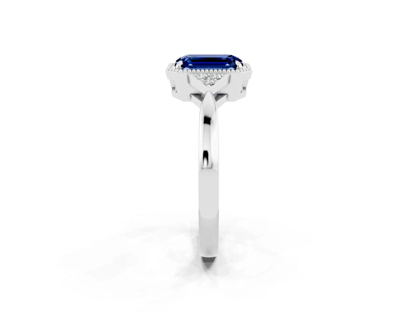 Platinum Emerald Cut Blue Sapphire Halo Ring with Tapered Band and Four-Prong Setting
