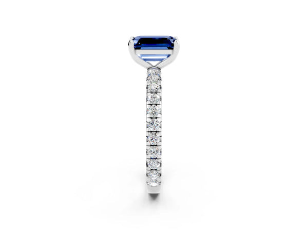 Platinum Emerald Cut Blue Sapphire Pavé Solitaire Ring with Round Band and Prong Setting