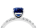 White gold Emerald Cut Blue Sapphire Pavé Solitaire Ring with Round Band and Prong Setting_40