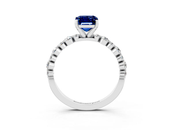 White gold Emerald Cut Blue Sapphire Prong Set Engagement Ring with Pavé Band