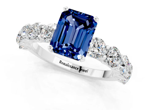White gold Emerald Cut Blue Sapphire Prong Setting with Side Stones on a Pave Band_1