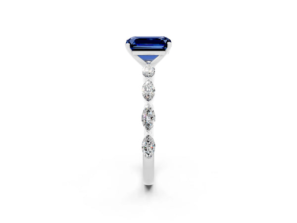 Platinum Emerald Cut Blue Sapphire Ring with Marquise Side Stones and Prong Setting