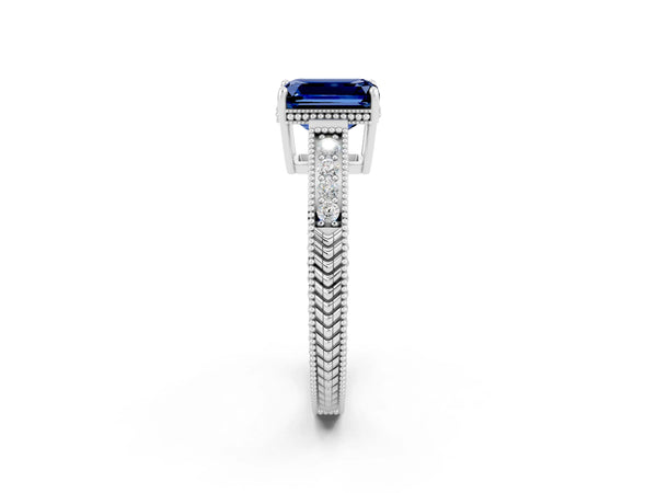 Platinum Emerald Cut Blue Sapphire Ring with Milgrain Pavé Band and Four-Prong Setting