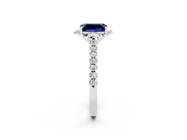 Platinum Emerald Cut Blue Sapphire Ring with Pavé Band and Floral Prong Setting
