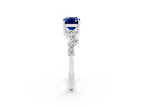 Silver Emerald Cut Blue Sapphire Scattered Round Accent Ring with Prong Setting