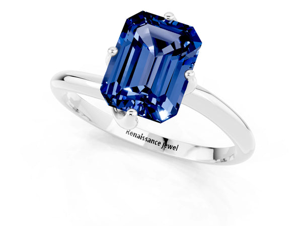 White gold Emerald Cut Blue Sapphire Solitaire Engagement Ring with Four-Prong Setting and Classic Band