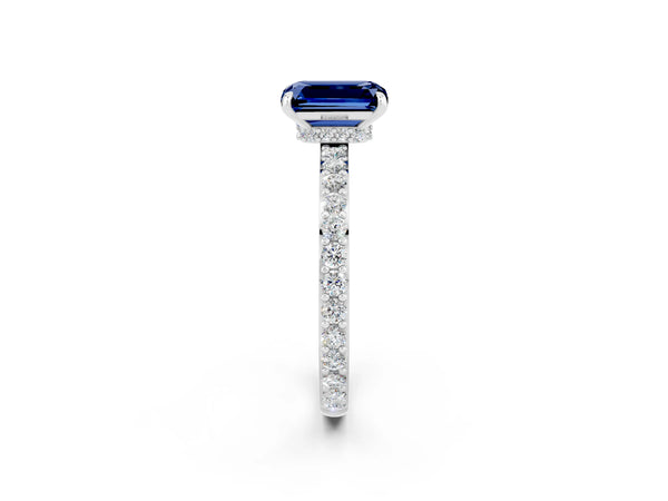White gold Emerald Cut Blue Sapphire Solitaire Engagement Ring with Pavé Band and Four-Prong Setting
