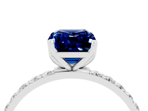 White gold Emerald Cut Blue Sapphire Solitaire Engagement Ring with Pavé Band and Prong Setting_4