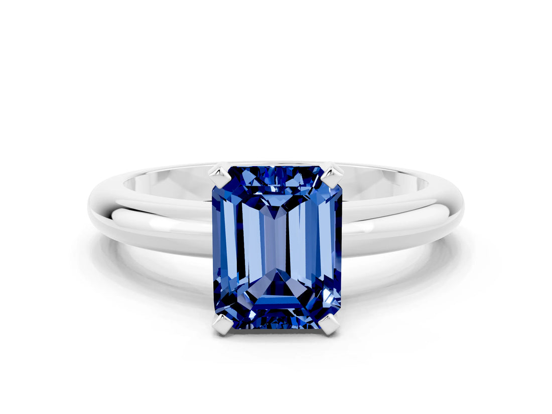 White gold Emerald Cut Blue Sapphire Solitaire Engagement Ring with Round Band and Four-Prong Setting
