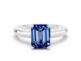 White gold Emerald Cut Blue Sapphire Solitaire Engagement Ring with Round Band and Four-Prong Setting