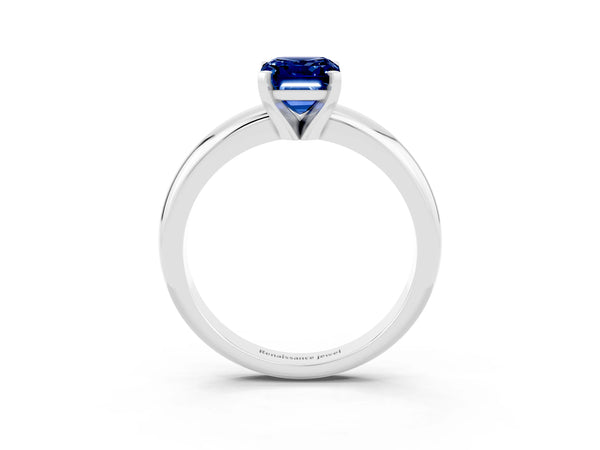 Silver Emerald Cut Blue Sapphire Solitaire Engagement Ring with Round Band and Four-Prong Setting