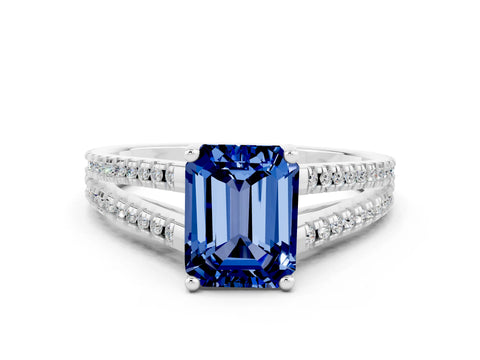 White gold Emerald Cut Blue Sapphire Solitaire Engagement Ring with Split Shank Pavé Band