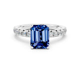 White gold Emerald Cut Blue Sapphire Solitaire Pavé Engagement Ring with Round Band and Prong Setting_12