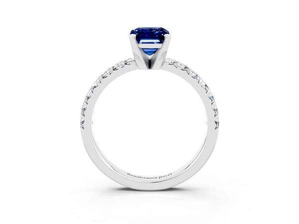 Platinum Emerald Cut Blue Sapphire Solitaire Pavé Engagement Ring with Round Band and Prong Setting