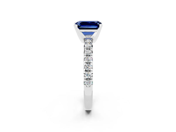 Silver Emerald Cut Blue Sapphire Solitaire Pavé Engagement Ring with Round Band and Prong Setting