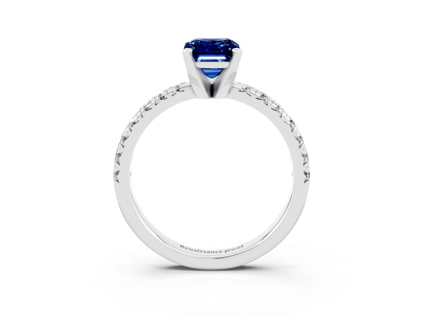 Platinum Emerald Cut Blue Sapphire Solitaire Pavé Engagement Ring with Round Band and Prong Setting