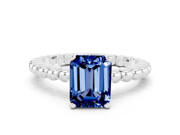 White gold Emerald Cut Blue Sapphire Solitaire Ring with Beaded Band and Prong Setting