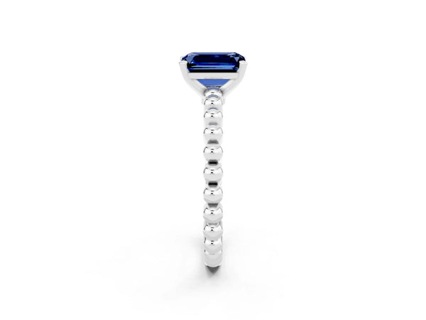 White gold Emerald Cut Blue Sapphire Solitaire Ring with Beaded Band and Prong Setting