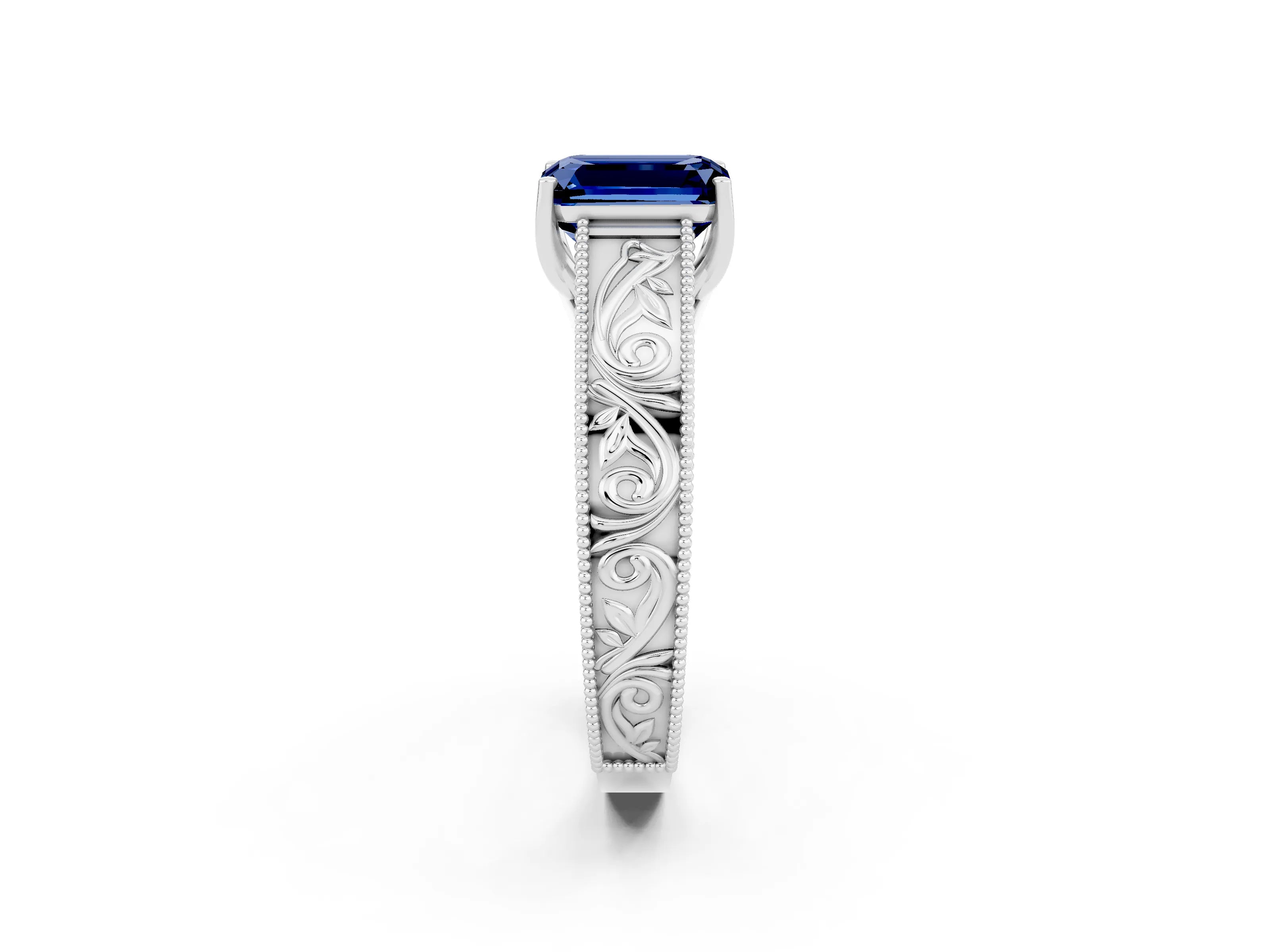 White gold Emerald Cut Blue Sapphire Solitaire Ring with Engraved Band and Four-Prong Setting_2