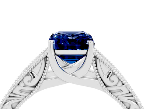 White gold Emerald Cut Blue Sapphire Solitaire Ring with Engraved Band and Four-Prong Setting_4
