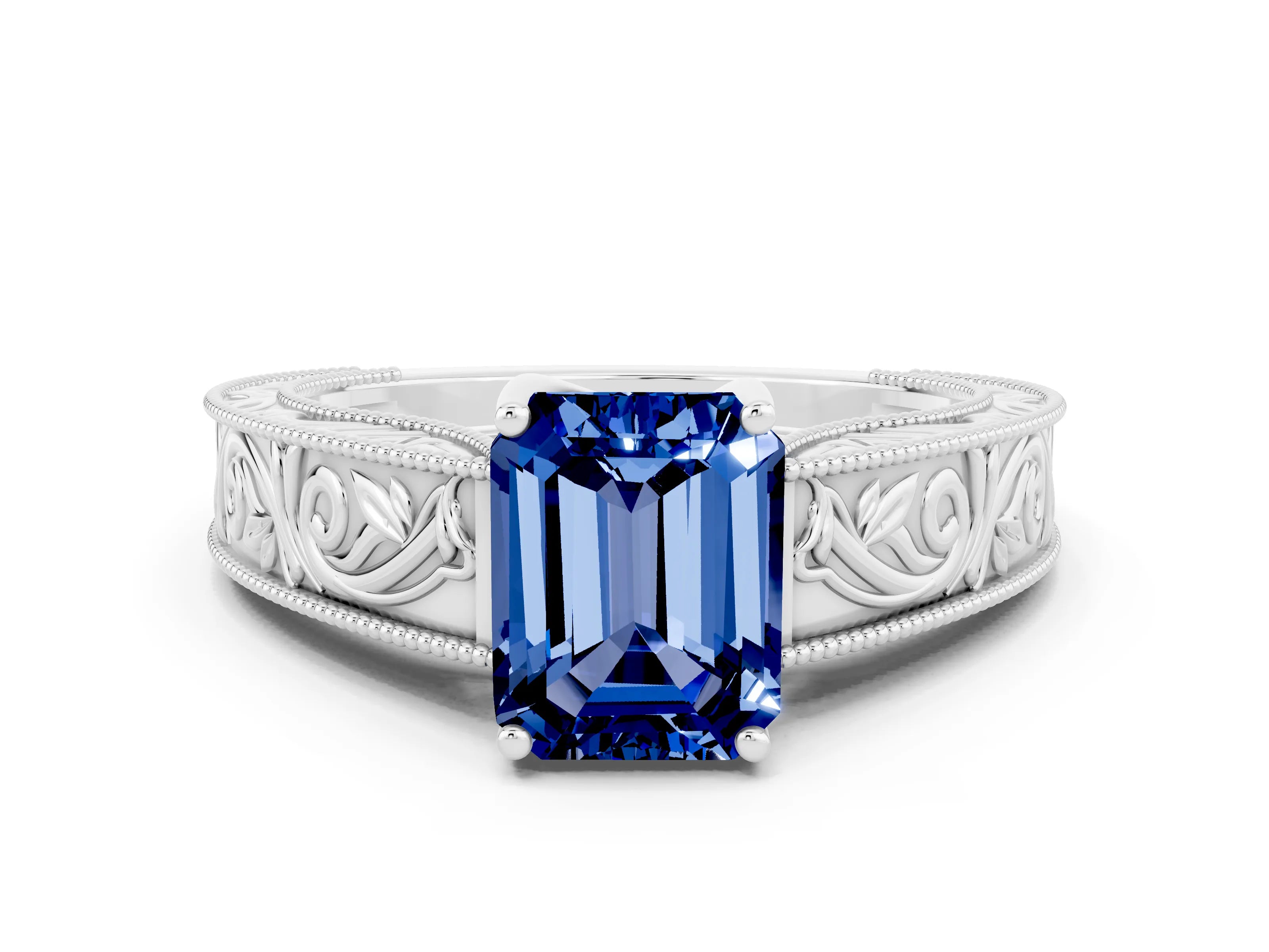 White gold Emerald Cut Blue Sapphire Solitaire Ring with Engraved Band and Four-Prong Setting