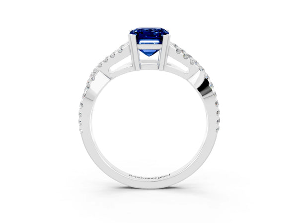 Platinum Emerald Cut Blue Sapphire Solitaire Ring with Four-Prong Setting and Twisted Pavé Band