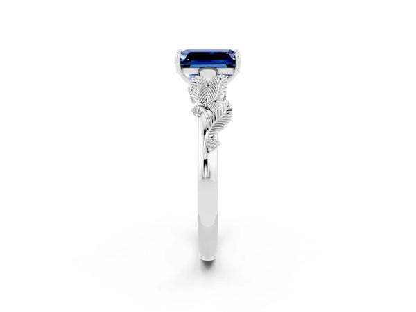 White gold Emerald Cut Blue Sapphire Solitaire Ring with Leaf Motif Band and Four-Prong Setting