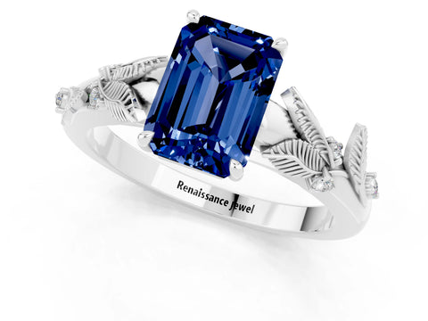 White gold Emerald Cut Blue Sapphire Solitaire Ring with Leaf Motif Band and Four-Prong Setting_1