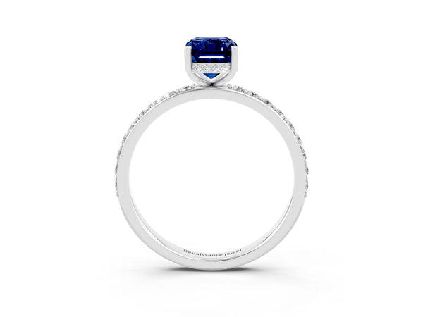 Silver Emerald Cut Blue Sapphire Solitaire Ring with Pavé Band and Hidden Halo