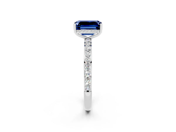 White gold Emerald Cut Blue Sapphire Solitaire Ring with Pavé Band and Hidden Halo