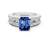 White gold Emerald Cut Blue Sapphire Solitaire Ring with Pavé and Channel Set Band_12