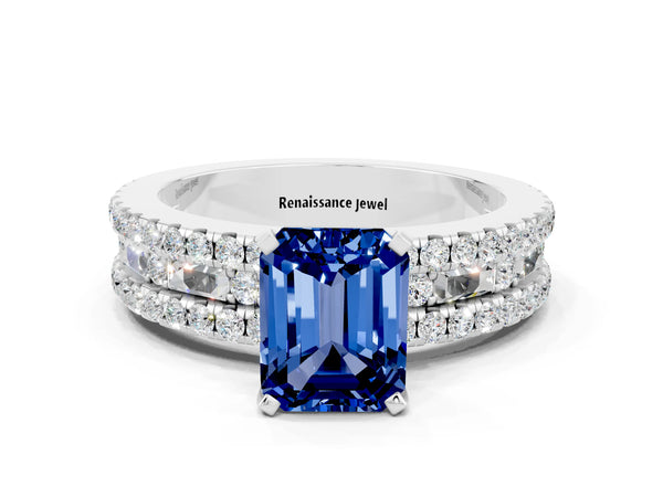 Platinum Emerald Cut Blue Sapphire Solitaire Ring with Pavé and Channel Set Band